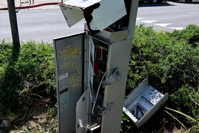 Water irrigation junction box on Mandela Parkway destroyed in order to steal copper wiring. (Image source: Sanford Forte) Water irrigation junction box on Mandela Parkway destroyed in order to steal copper wiring. (Image source: Sanford Forte)