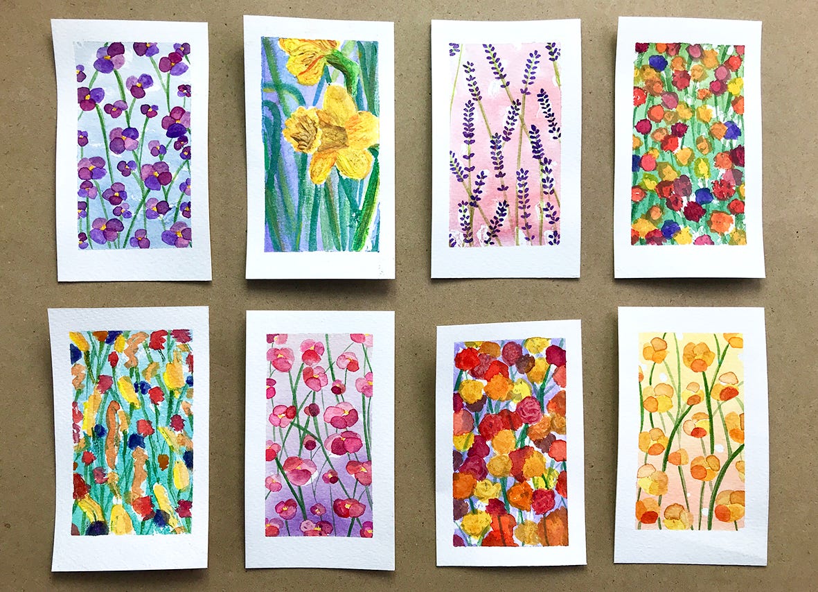 a photo of eight small floral paintings that are mostly watercolour paints and in all different colours