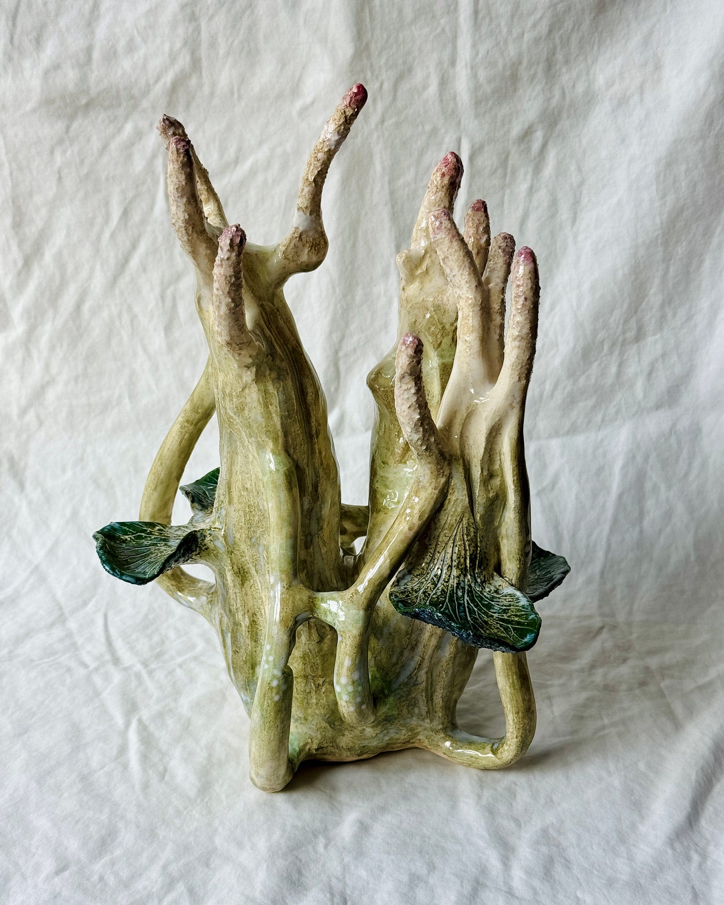 Stoneware sculpture The Giving Tree by Moti Tavassoli, finished with underglaze and glaze.