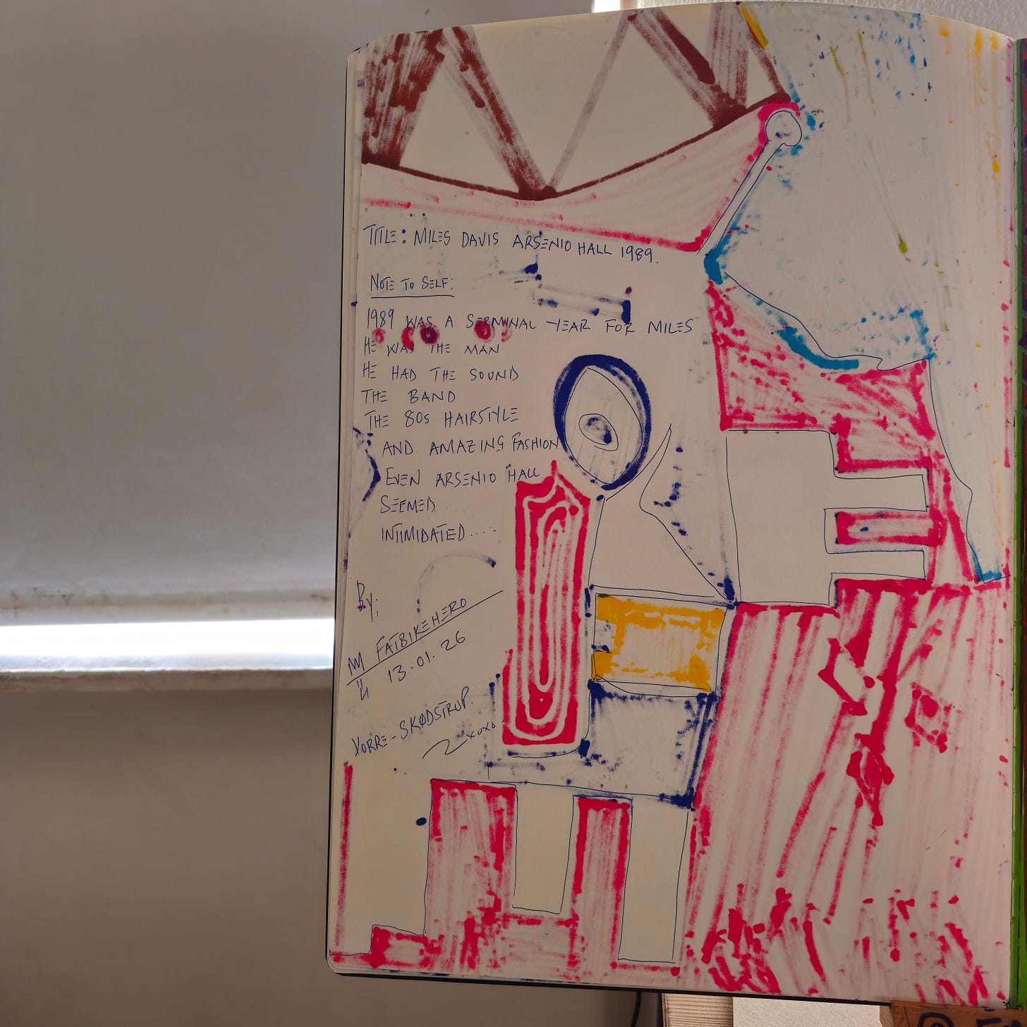 Alt Text: The verso of a sketchbook page by FatbikeHero featuring red ink sketches and handwritten text about Miles Davis. The notes highlight 1989 as a seminal year, mentioning Davis's 'sound,' '80s hairstyle,' and 'amazing fashion' on the Arsenio Hall show. Alt Text: The verso of a sketchbook page by FatbikeHero featuring red ink sketches and handwritten text about Miles Davis. The notes highlight 1989 as a seminal year, mentioning Davis's 'sound,' '80s hairstyle,' and 'amazing fashion' on the Arsenio Hall show.