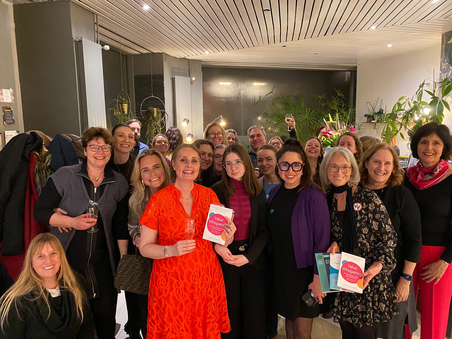 A picture of author, Melitta Campbell, and guests at the book launch party for Value Whispering: The Smarter Way to Market Your Small Business ... that just happens to be brilliant for introverts. A picture of author, Melitta Campbell, and guests at the book launch party for Value Whispering: The Smarter Way to Market Your Small Business ... that just happens to be brilliant for introverts.