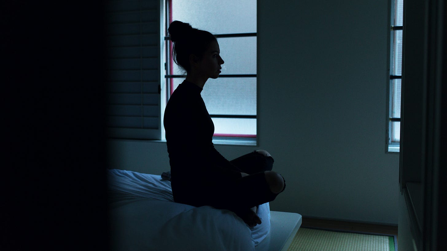 Photo of woman in the dark by Ben Blennerhassett. Buhay Copywriter Regina Peralta mental health tips article Photo of woman in the dark by Ben Blennerhassett. Buhay Copywriter Regina Peralta mental health tips article