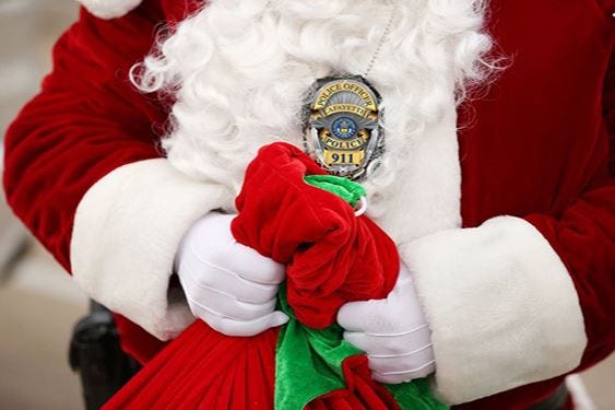 Santa with badge and bag