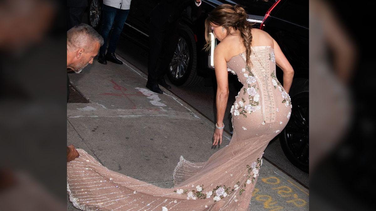 Photo of Jennifer Lopez's skirt fell off mid-performance during a concert in Poland. Photo of Jennifer Lopez's skirt fell off mid-performance during a concert in Poland.