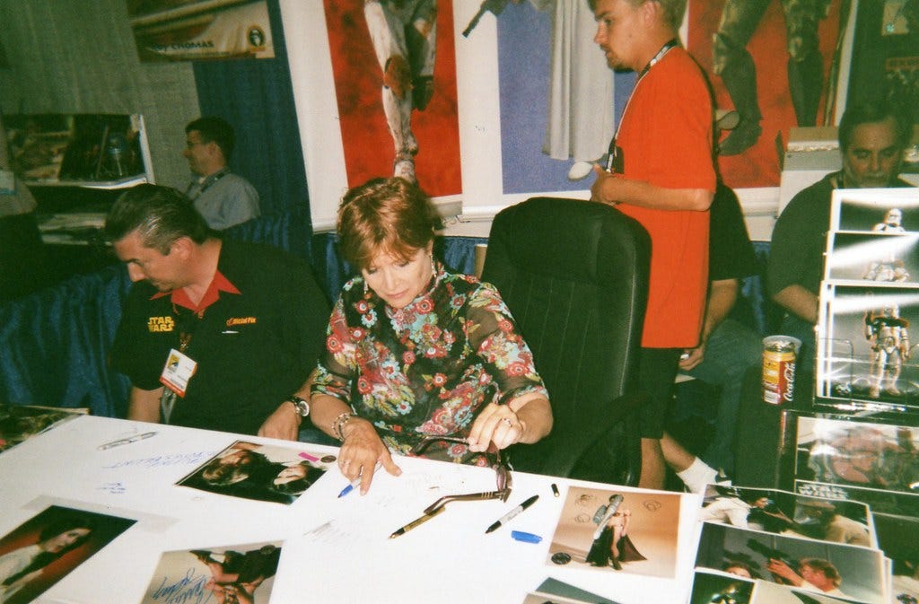 Carrie Fisher (princess leia) signing autographs | V Threepio | Flickr