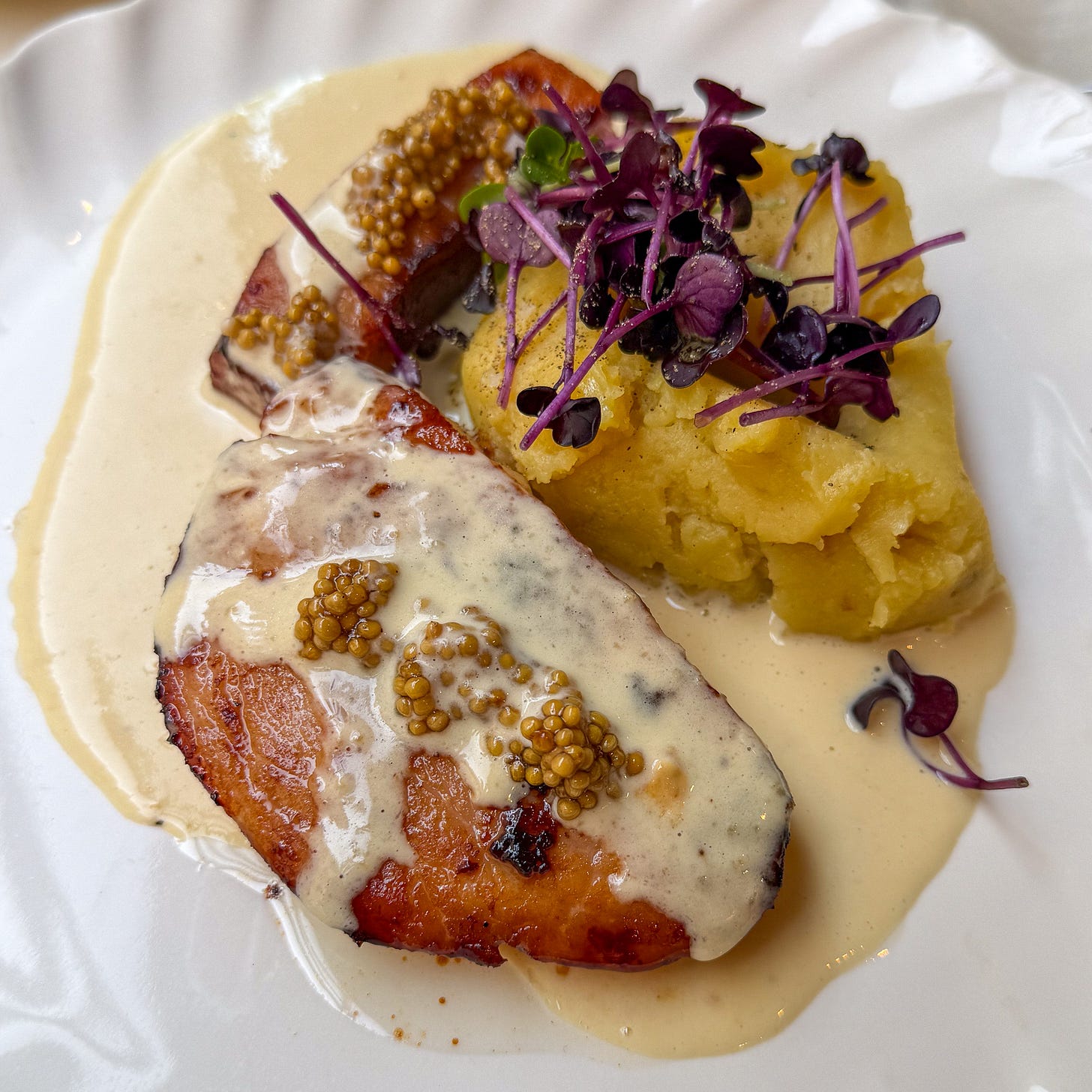 Jambon rôti with smashed potatoes and Parmesan cream sauce at Argile, Paris 9th Jambon rôti with smashed potatoes and Parmesan cream sauce at Argile, Paris 9th