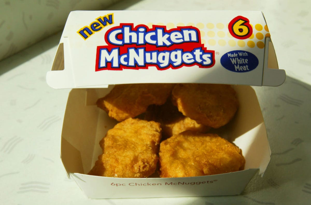 A six-piece box of Chicken McNuggets.