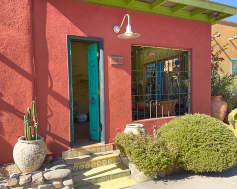 The photos display nine homes in the Sonoran architectural style traditional to the Southwest of the United States. The homes feature flat roofs, front walls that begin at the sidewalk's edge, colorful stucco exterior walls, and large windows.