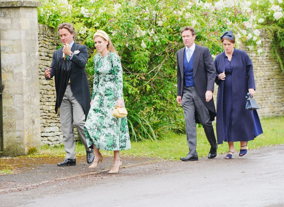 Princess Eugenie Opts for Oversized Navy Coat at Peter Phillips's Wedding Princess Eugenie Opts for Oversized Navy Coat at Peter Phillips's Wedding