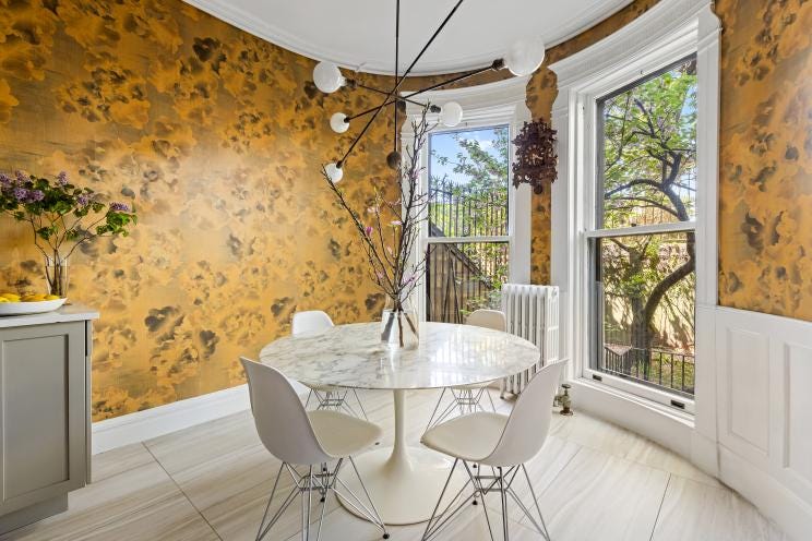 The residence is dressed in their wallpaper.