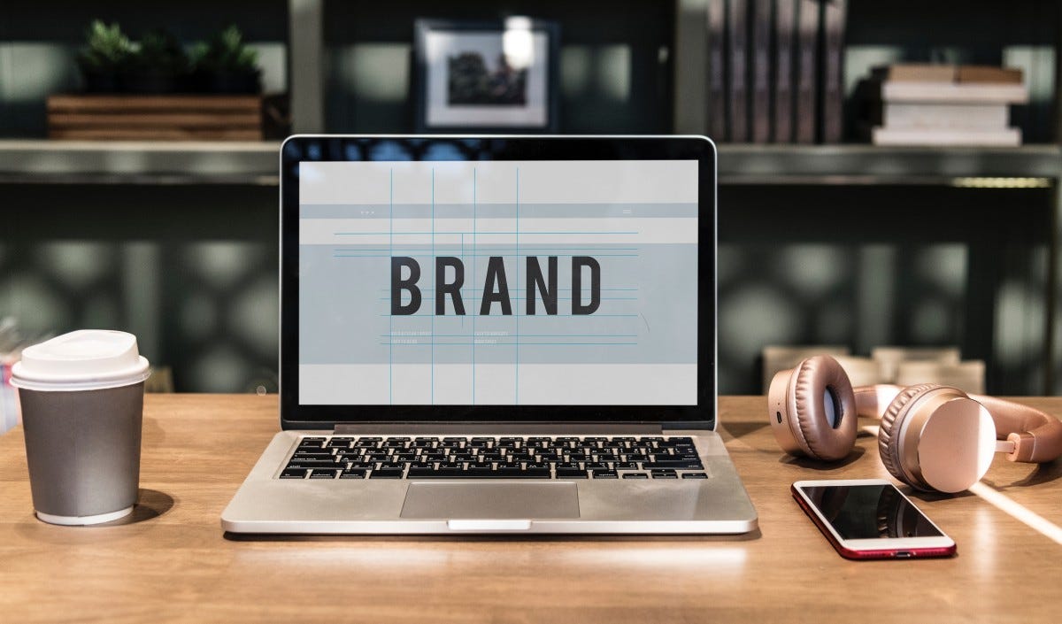 product, laptop, personal computer, technology, electronic device, desk, website, computer, brand, output device, computer keyboard, multimedia, desktop computer, cup, gadget, logo, space bar, office equipment, netbook, office, computer desk