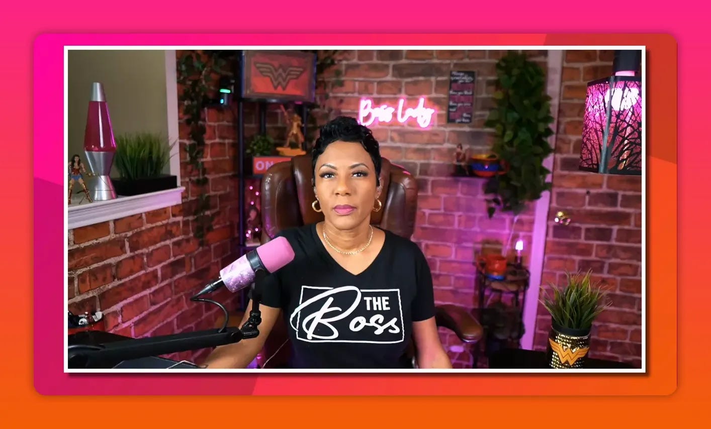 Home live-stream setup with presenter, pink microphone, warm lighting and neon sign on a brick wall. Home live-stream setup with presenter, pink microphone, warm lighting and neon sign on a brick wall.