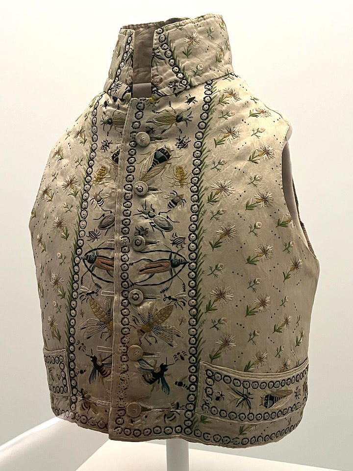 Garments from the Sleeping Beauties show at the Met all featuring some bug-related inspiration.
