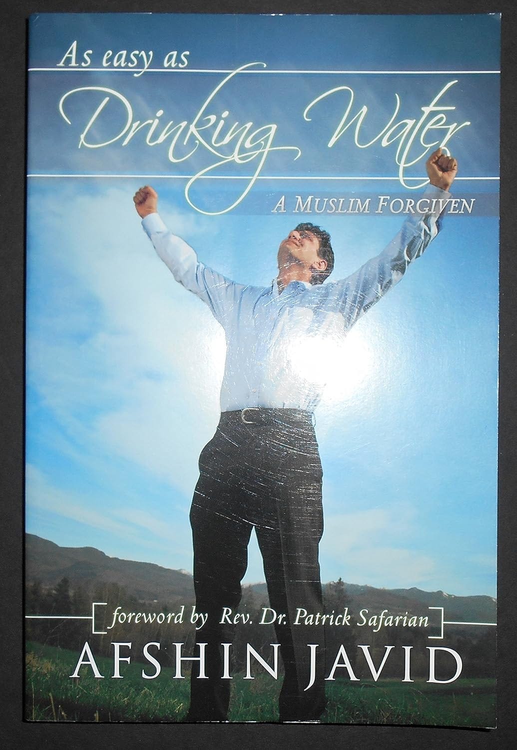 As Easy as Drinking Water, A Muslim Forgiven: Afshin Javid: 9781606150382: Amazon.com: Books