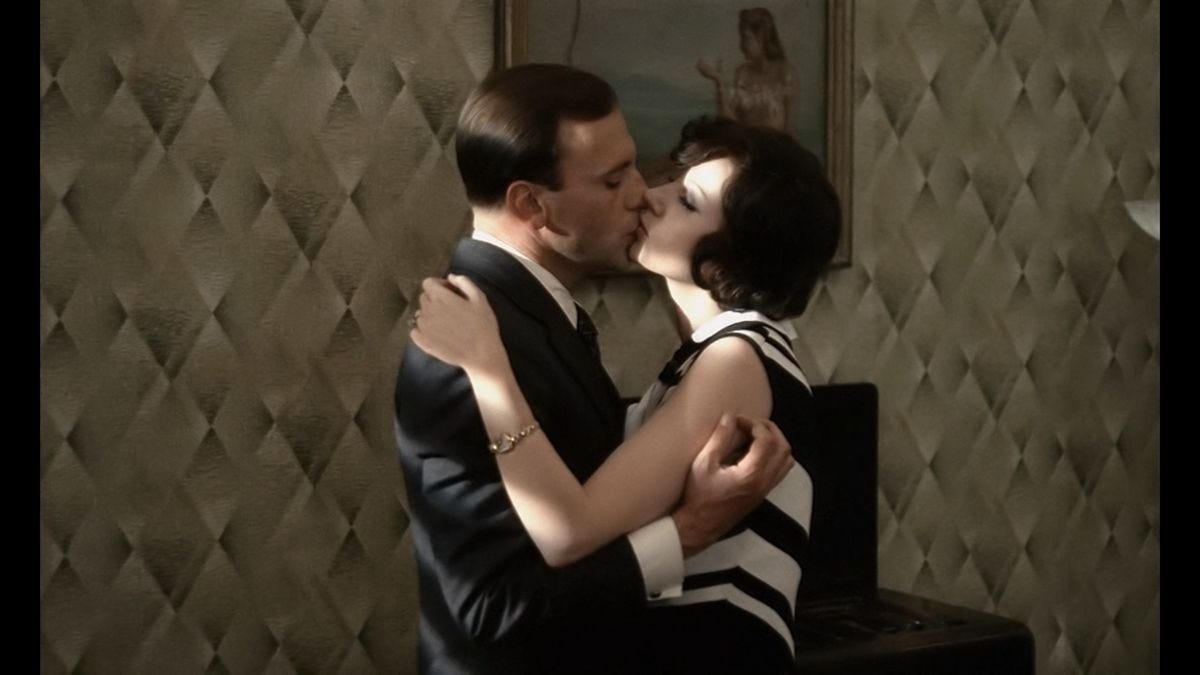 Jean-Louis Trintignant and Stefanie Sandrellia embrace in "The Conformist" (1970)