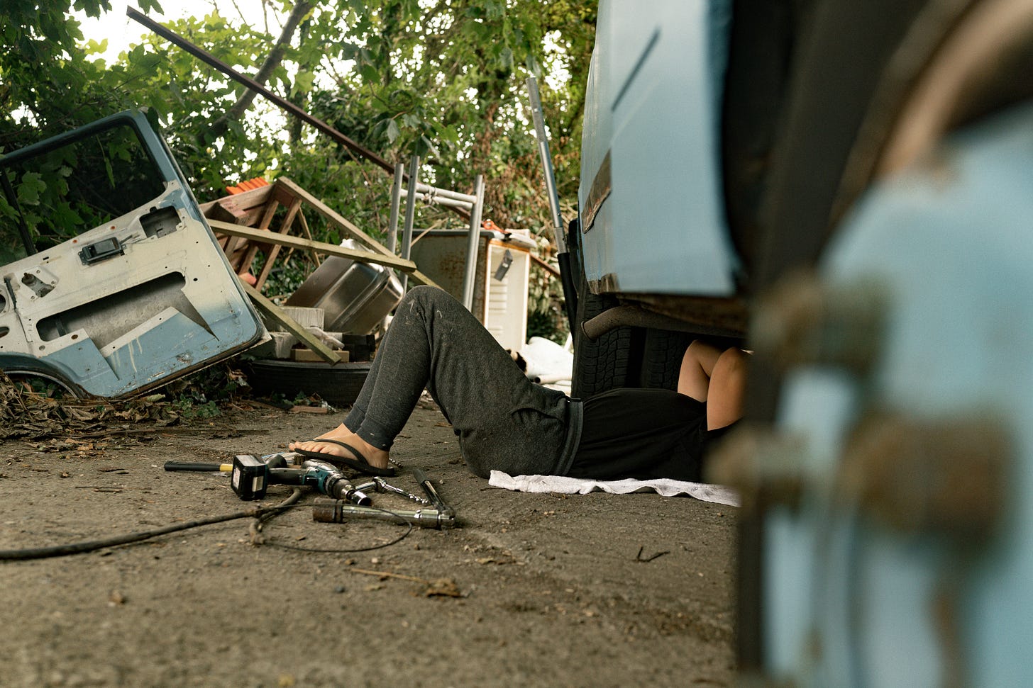 female girl woman mechanic petrol head growing up story travel writer van life welding repair spanners bodge fix LDV Convoy British vehicles old 