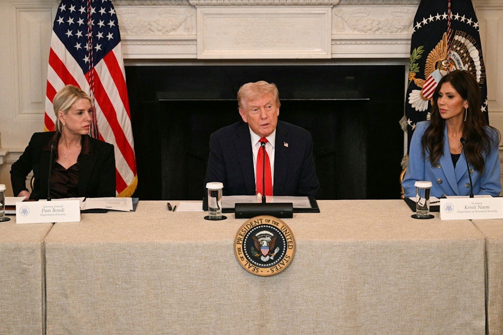 President Donald Trump, flanked by Attorney General Pam Bondi and Homeland Security Secretary Kristi Noem, speaks during a roundtable about Antifa in the State Dining Room of the White House.