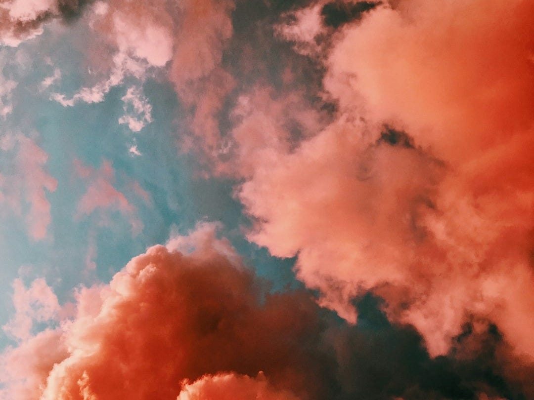 orange smoke on blue background