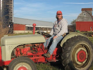 Rob on a tractor