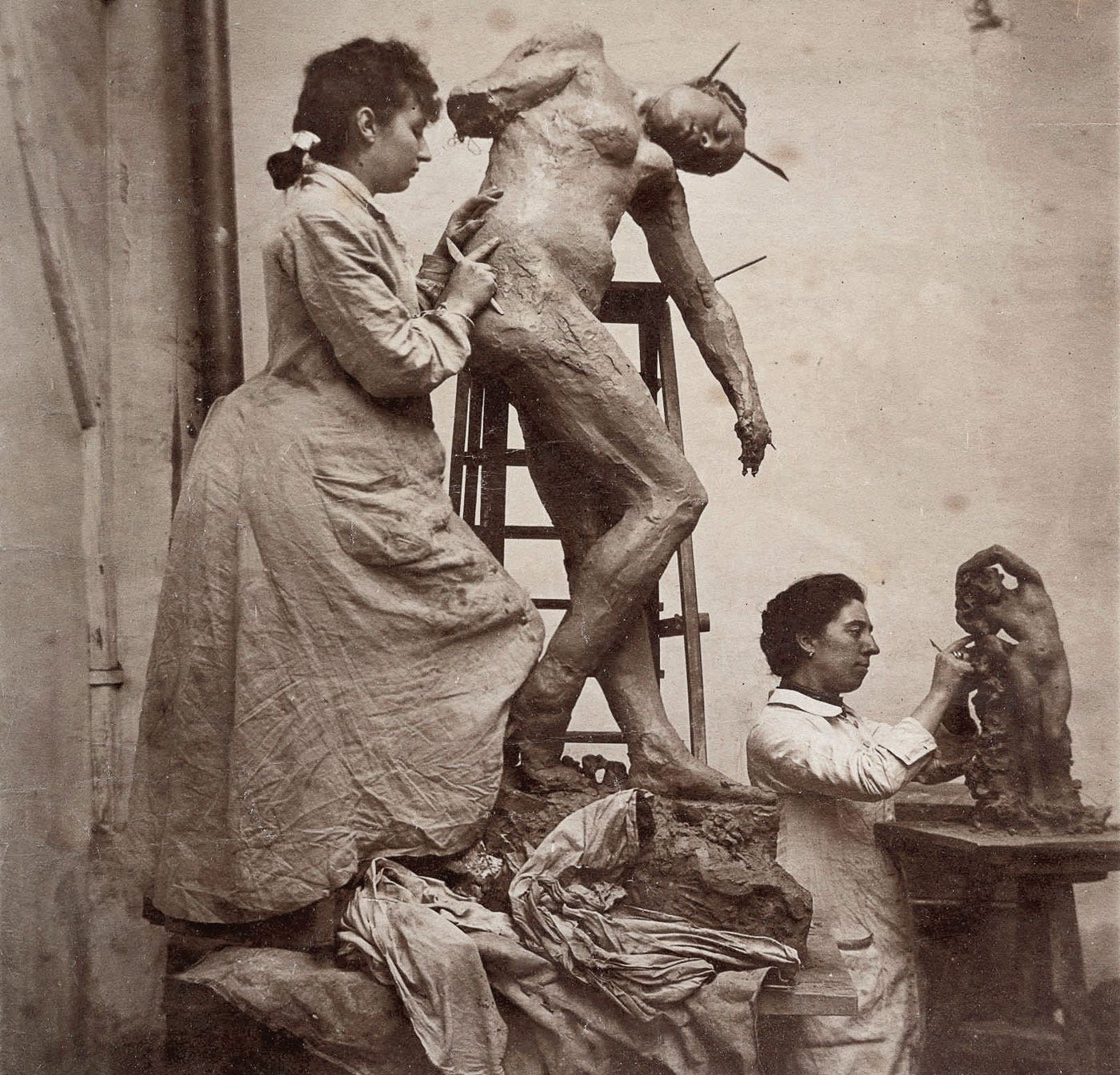 Camille Claudel and Jessie Lipscomb in their studio. Both would work as Rodin's assistants.