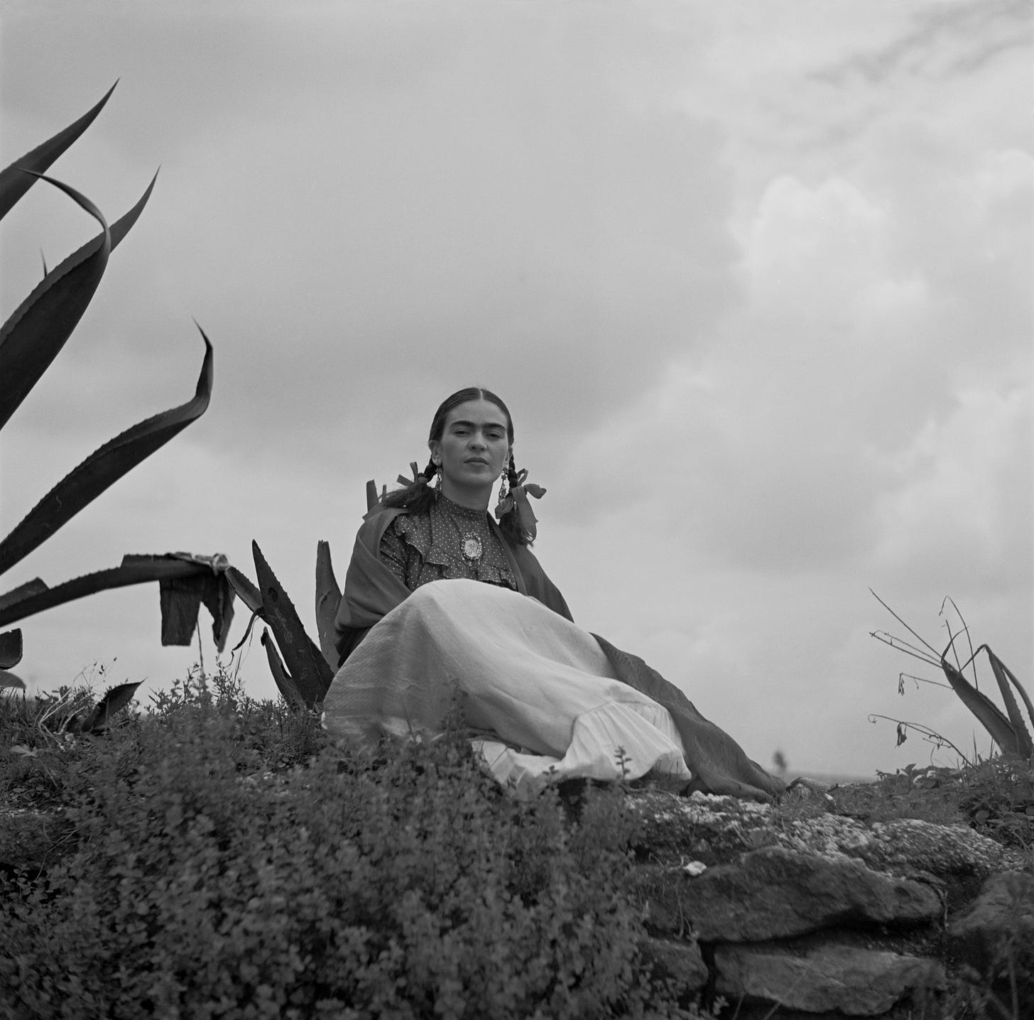 Toni Frissell Frida Kahlo, seated next to an agave Toni Frissell Frida Kahlo, seated next to an agave