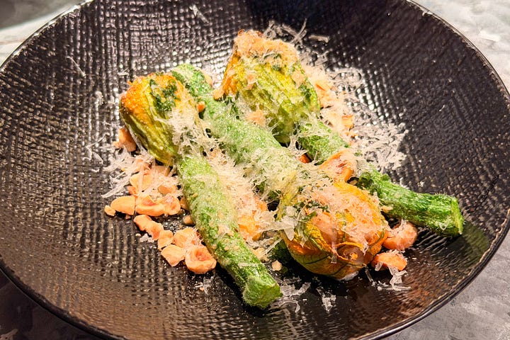 Courgettes stuffed with prawns; harm-torn pasta with brown crab