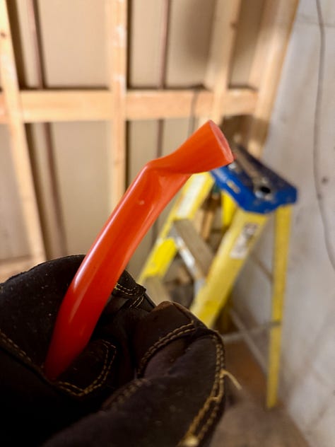 Two images showing a kink in a PEX tube and a splice to fix the kink.