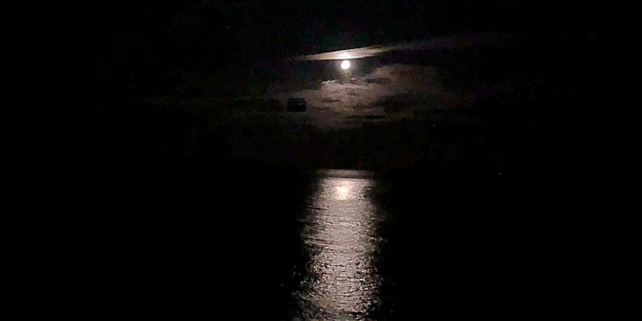 Walking beneath the full moon
