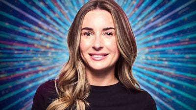 A head and shoulder shot of Dani, a woman with long hair, wearing a dark top, set against a glittering blue background