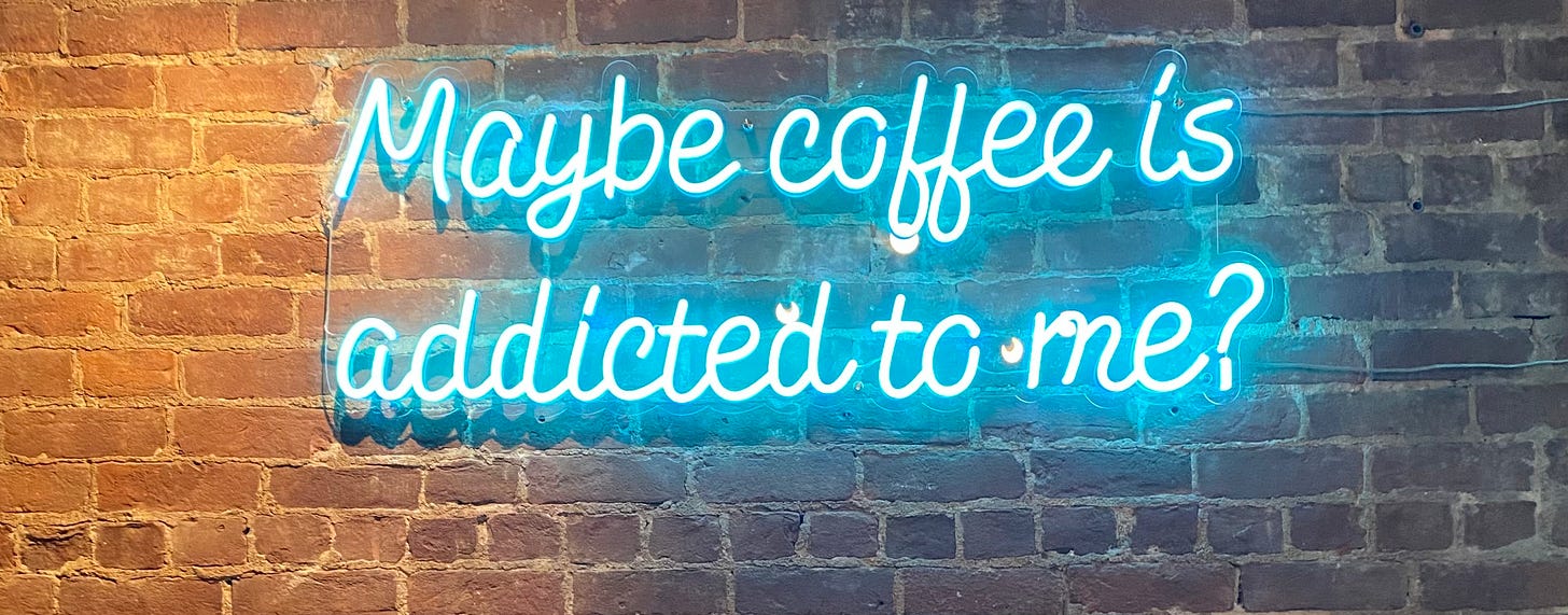 neon sign that says: Maybe coffee is addicted to me