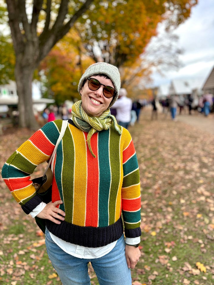 Four images depict me wearing handmade knitwear, a collection of yarns in fall colors, a smiling angora goat, and a smiling selfie with my friend