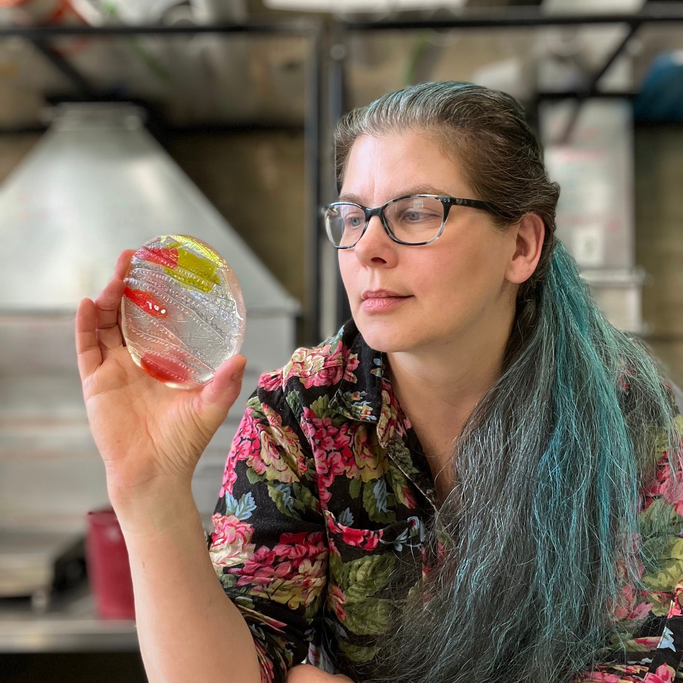 Spike casts glass and reads fairy tales