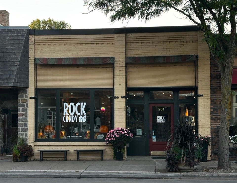 A store front with a sign on the window
Description automatically generated A store front with a sign on the window
Description automatically generated