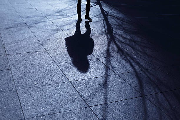 Focus On Shadow Shadow Ominous Street Stock Photos, Pictures & Royalty ...