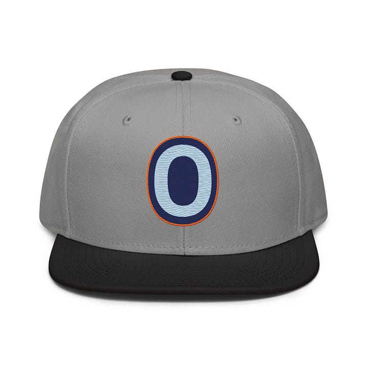 The Outfield O Logo Snapback Hat in Gray/Black