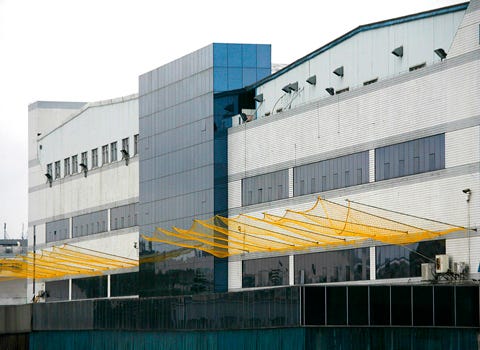 Foxconn workers to get pay raises - Taipei Times