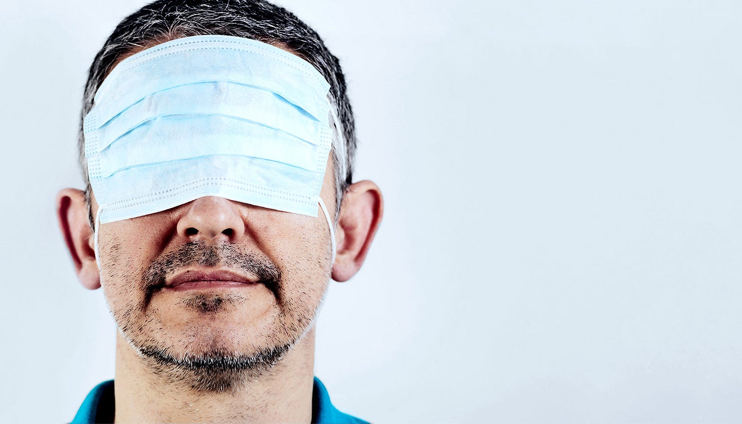 Man blinded by face mask