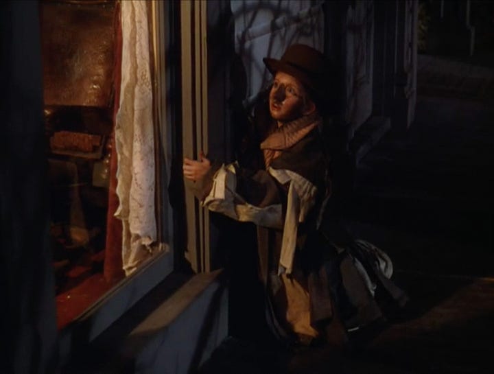Tootie in the Halloween Scene in Meet Me In St. Louis, grabbing bags of flour, looking inside a window, throwing flour in a man's face, and running away from the house on a dimly-lit street