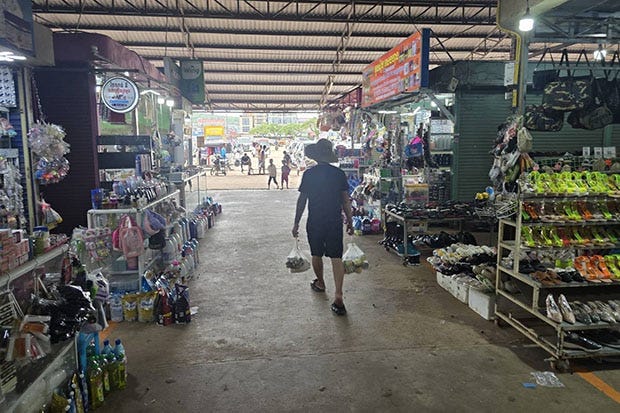 A Cambodian leaves a market in Koh Kong province in Cambodia after finishing his shopping. (Photo: Jakkrit Waewklaihong)