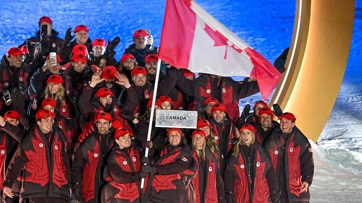 Flag-bearers Mikaël Kingsbury, left, and Marielle Thompson.