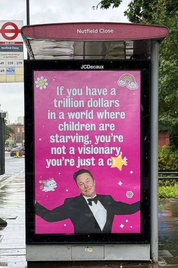 May be an image of text that says "BUSSTOF SUS STOP Nutfield Close lose Nutfield Close ar 49 259 279 49 N279 JCDecaux If you have a trillion dollars in a world where children are starving, you're not a visionary you're just a c" May be an image of text that says "BUSSTOF SUS STOP Nutfield Close lose Nutfield Close ar 49 259 279 49 N279 JCDecaux If you have a trillion dollars in a world where children are starving, you're not a visionary you're just a c"