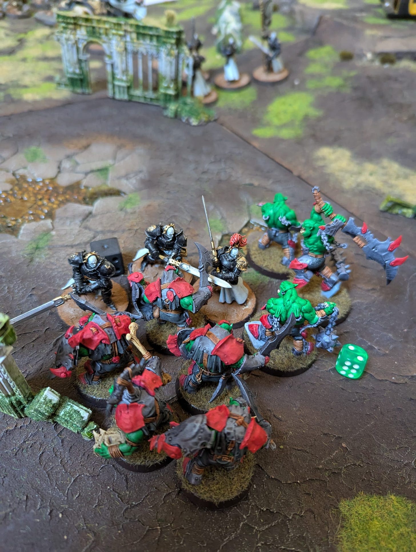 Warhammer age of sigmar spearhead stormcast eternals fighting some ironjawz but they're vastly outnumbered