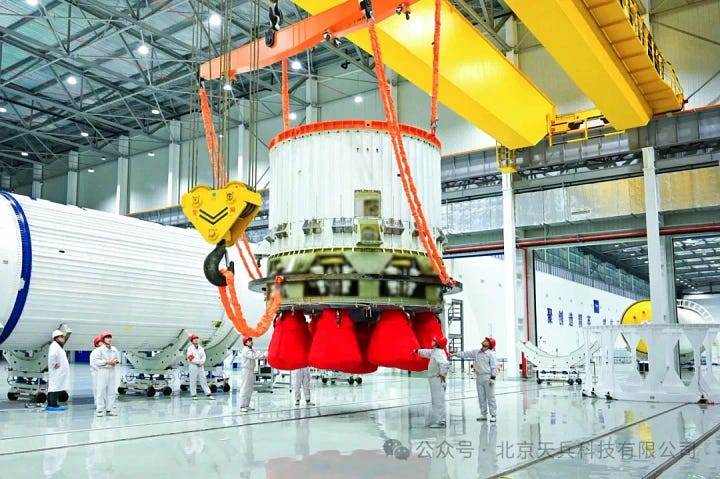 Tianlong-3's first-stage engine section undergoing static load tests (left) and during integration operations for the assembly of the first-stage (right).