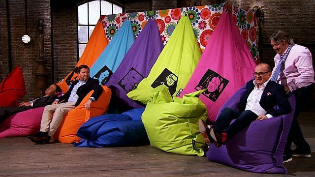 Investors sitting in colorful bean bags during a lighthearted startup pitch on Dragons’ Den.