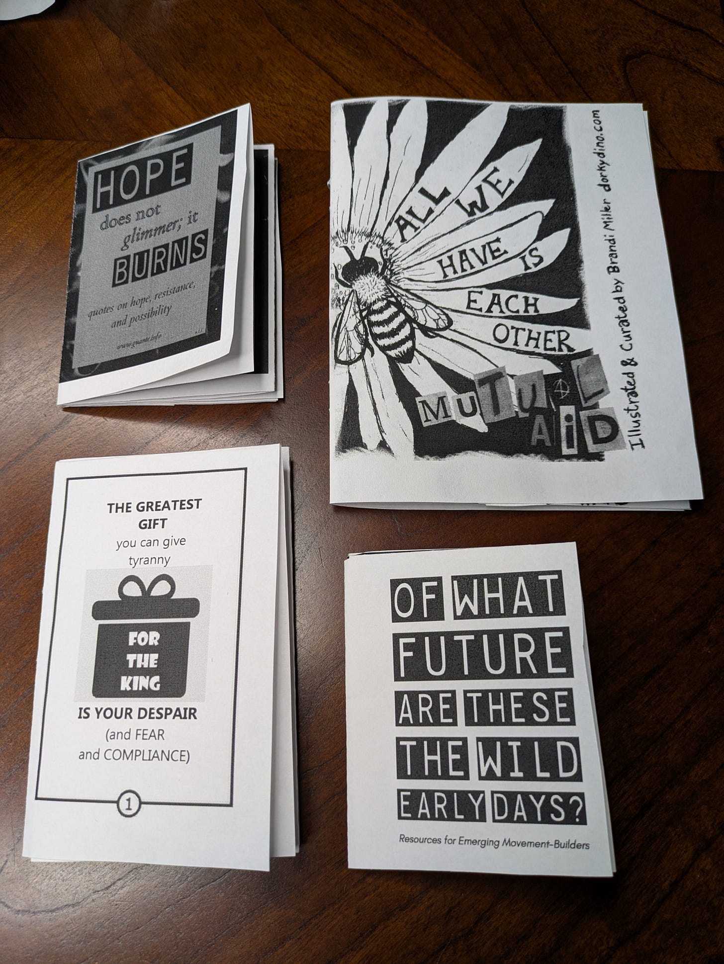 Four folded zines Four folded zines