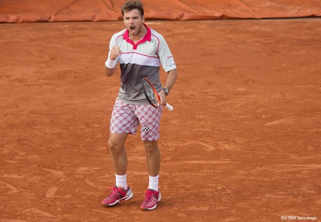 r/tennis - Stan Wawrinka holding a tennis racket