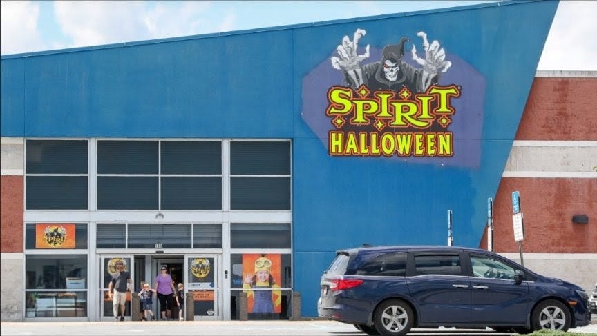 A Spirit Halloween store occupying a former big-box retail storefront.