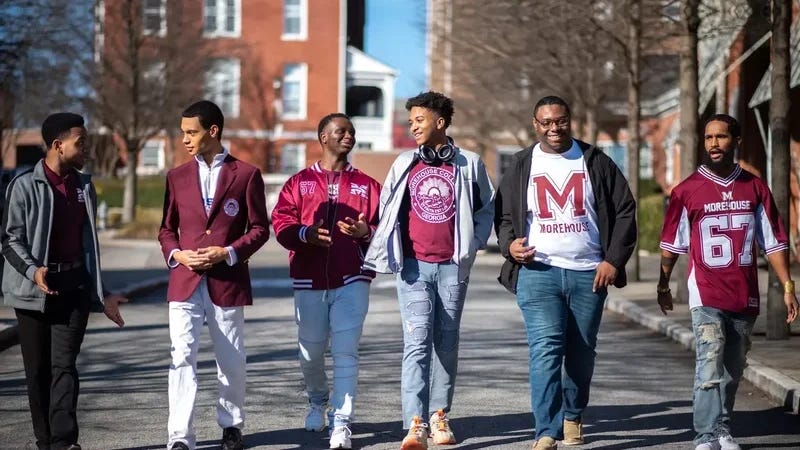 Morehouse College students wear Morehouse swag and walk on campus. Morehouse College students wear Morehouse swag and walk on campus.