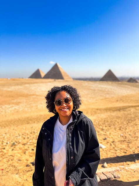 3 photos: 1 of a golden sarcophagus in the Egyptian museum, 1 of a beautiful bedroom on a nile sailboat where you can see the water through the window, and 1 of Anela standing smiling in the foreground with the pyramids in the background.