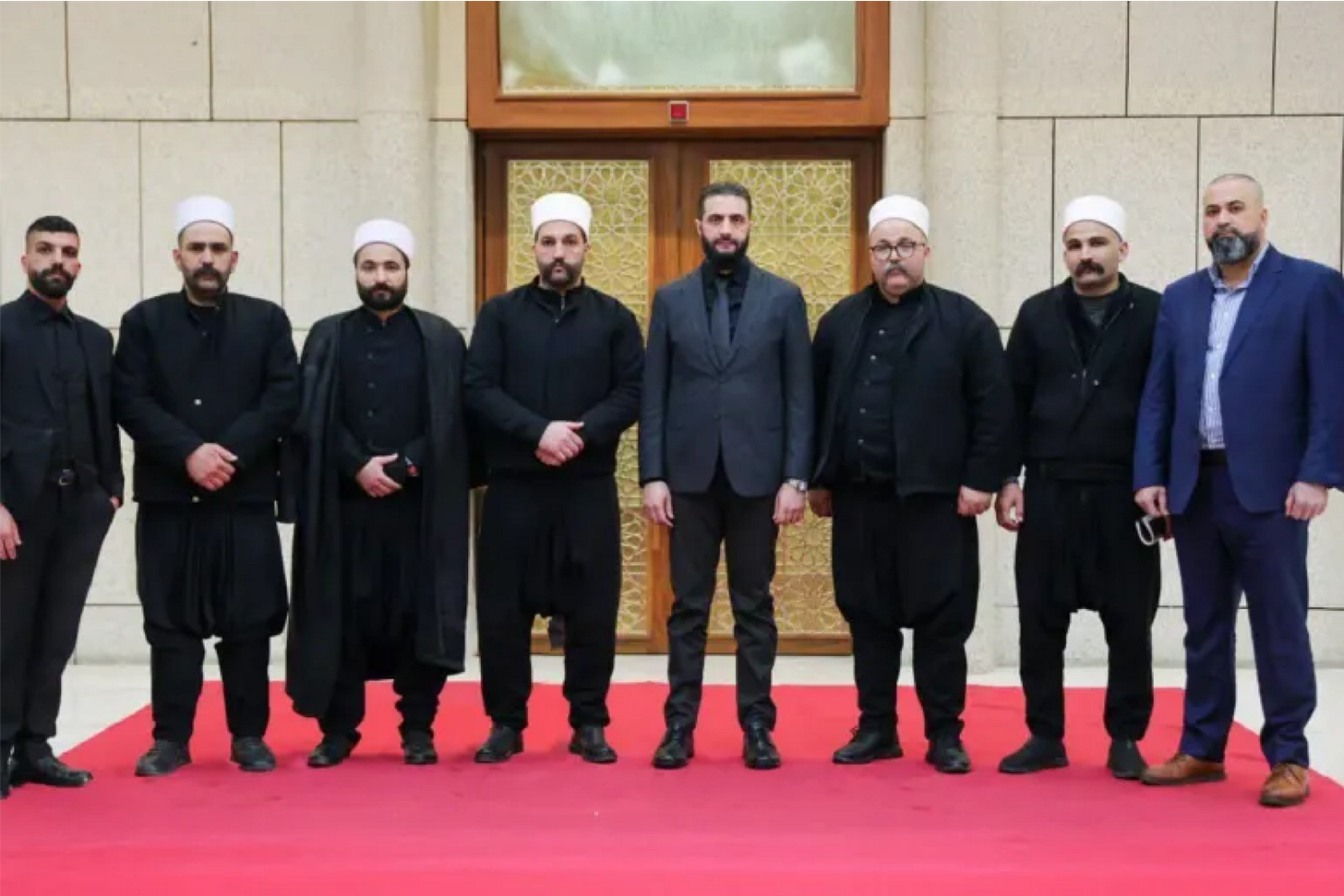 Laith Balhousan leader of the Druze standing with President Ahmed Al-Sharaa inside Syrian Presidential Palace. 